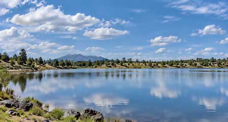 Ashurst Lake near Flagstaff Arizona with open shoreline, fishing water and San Francisco Peaks views
