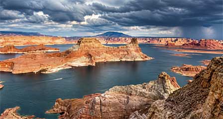 Lake Powell blue water and sandstone cliffs and canyons near Page Arizona