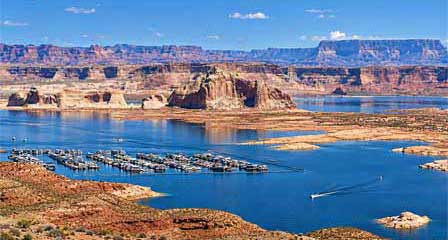 Wahweap Marina and Lake Powell surrounded by sandstone canyon walls near Page Arizona
