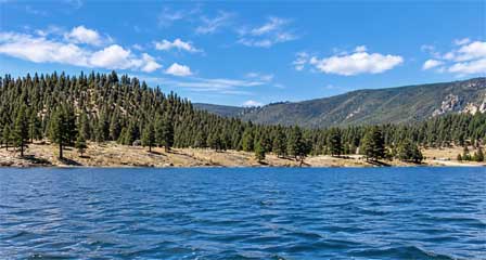 Luna Lake near Alpine Arizona surrounded by high-elevation meadows and mountain scenery