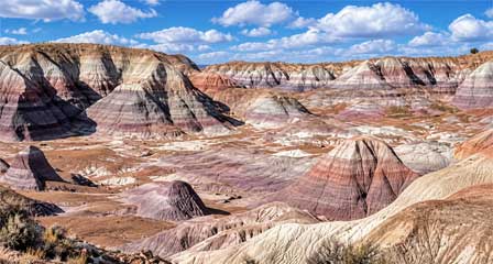 Rounded Painted Desert hills displaying colorful bands of ancient sedimentary rock