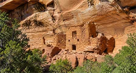 Ancient cliff dwelling beneath a sandstone overhang at Palatki Heritage Site near Sedona Arizona