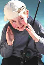 Boy fishing at a local lake.