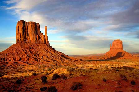 Sunset over the sandstone buttes of Monument Valley Navajo Tribal Park