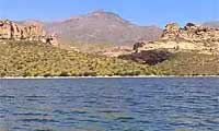 Apache Lake surrounded by rugged Salt River canyon mountains in central Arizona
