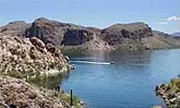 Canyon Lake Arizona boating surrounded by desert cliffs and Sonoran Desert scenery