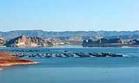 Marina and boats on Lake Mead surrounded by desert mountains
