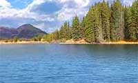 Reservation Lake surrounded by forest and mountains in the beautiful White Mountains Arizona