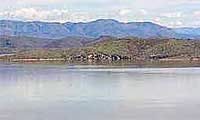 Theodore Roosevelt Lake in central Arizona surrounded by desert and rugged mountains