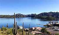 Saguaro Lake near Phoenix with boats marina and desert canyon shoreline